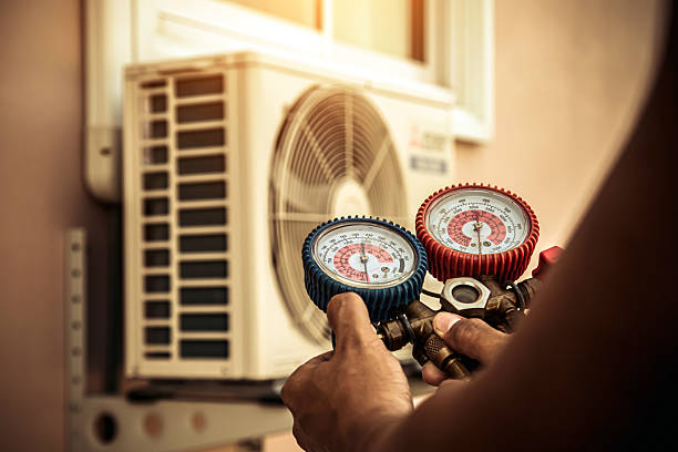 Professional Emergency Hvac technician working in Holly Springs, GA